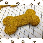 One bone-shaped, golden cheese dog treat in this Cheese Treats for Dogs Recipe.